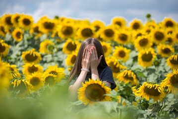 girl in a sunflower field