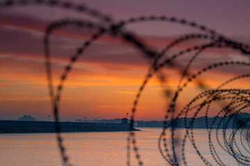 Fototapeta na wymiar Dawn in barbed wire 