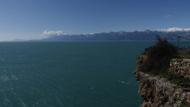 touristic cliff city antalya in mediterranean turkey coastline by the mediterranean sea with mountains	
