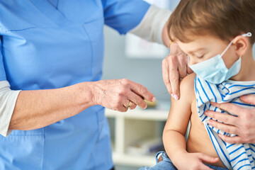 Fototapeta premium Young kids during vaccination in hospital