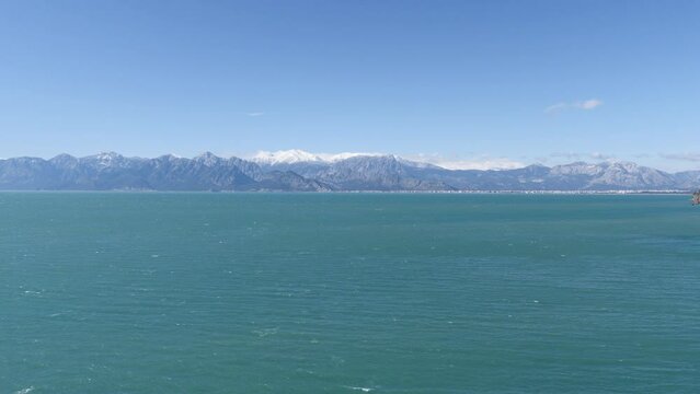 touristic cliff city antalya in mediterranean turkey coastline by the mediterranean sea with mountains