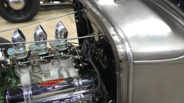 This video shows a tri power carburetor hotrod engine.