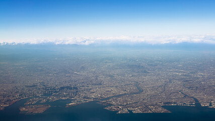 Elevate landscape of houses and roads at Fujinomiya city near the coast.