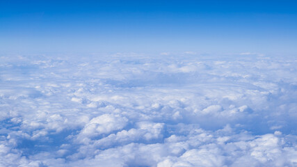 Naklejka na ściany i meble Beautiful cloudscape with blue sky. Wonderful panorama above white clouds
