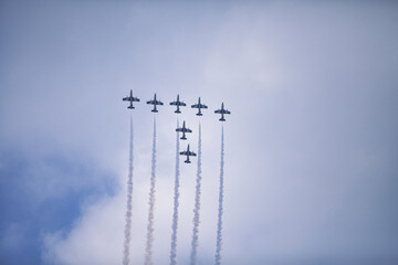 Shot of the war planes flying  symmetrical in the air during  Royal Belgian Air Force Days 2014