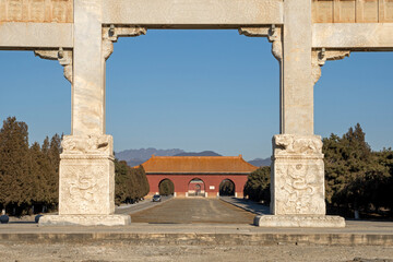 Fototapeta na wymiar Stone archway and Great Red Gate in Dongling scenic spot of the Qing Dynasty, China