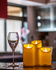 Christmas diwali decoration with fairy lights, candles, books,  Cozy home and holiday concept spa and relax