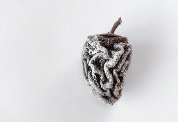 Dried persimmon on a white background. Healthy diet