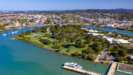 Aerial view of marina and university with city in background