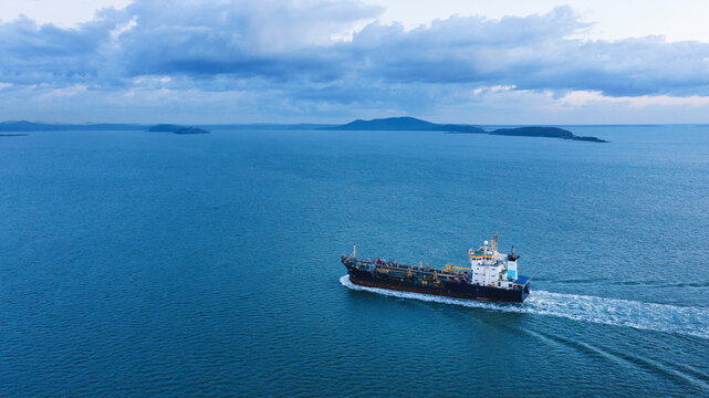 Horizontal shot of a ship travelling from right to left