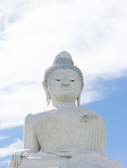 Big Buddha lovely large statue made from white marble on top of mountain in Phuket Thailand