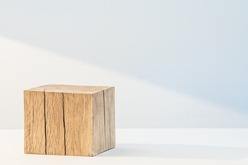 Oak cube on a white background. Organic natural podium