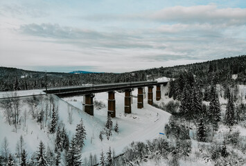 railway bridge in the winter taiga