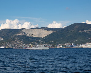 Fototapeta na wymiar A merchant ship in the bay of the city of Novorossiysk on a raid in the summer
