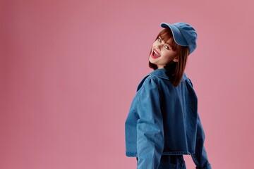 Portrait of a charming lady stylish denim clothing posing color background unaltered