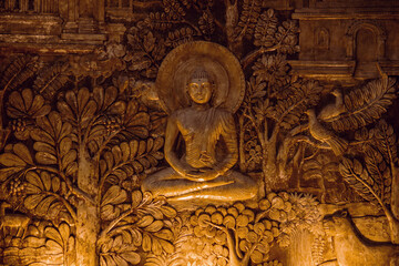 Buddha wood carvings at Gangaramaya Temple, Colombo,  Sri Lanka