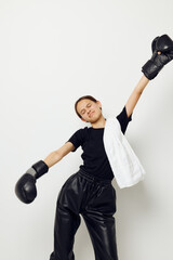 athletic woman with towel boxing black gloves posing sports isolated background