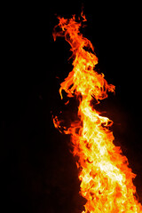 Close up burning flames on black background for graphic design or wallpaper