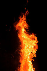 Close up burning flames on black background for graphic design or wallpaper