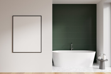 Modern bathroom interior with white ceramic bathtub. Green tile on walls, hardwood flooring. Blank framed poster on wall. Mockup. 3d rendering.