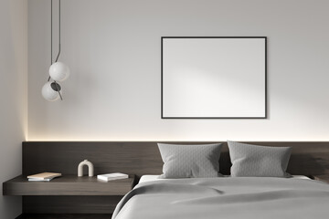 Light bedroom interior with bed and lamp, decoration. Mockup poster