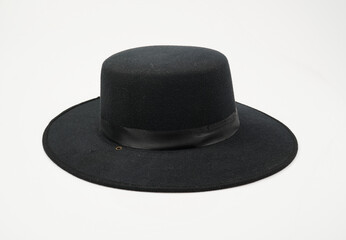 black wide brimmed hat on white background - obrazy, fototapety, plakaty