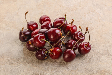 Ripe sweet cherry berries heap
