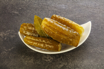 Marinated pickled cucumbers in the bowl