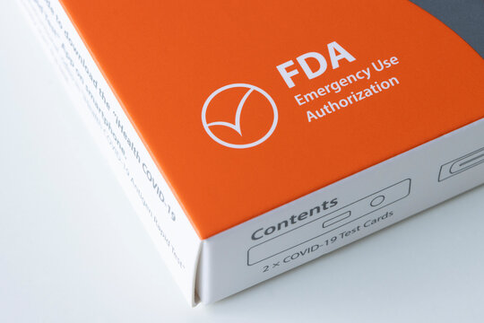 Portland, OR, USA - Feb 5, 2022: Closeup of the U.S. Food and Drug Administration (FDA) Emergency Use Authorization (EUA) label on a free iHealth COVID-19 Antigen rapid test kit ordered from USPS.