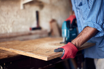 Man assembling furniture and fixing it - hobby concept.