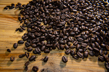 roasted coffee beans on wood table