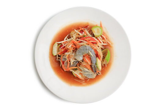 Shrimp papaya salad in dish isolated on white background. Image with Clipping path. Top view.
