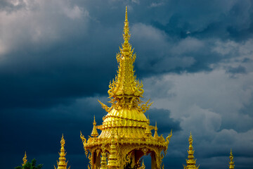 Naklejka premium background Wat Rong Khun The White Temple and pond with fish, in Chiang Rai, Thailand