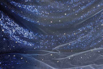 Dark blue with silver stars tulle chiffon texture background