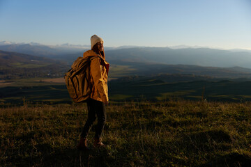 woman tourist admiring the landscape mountains nature Lifestyle