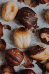  nuts and cacao powder on grey background