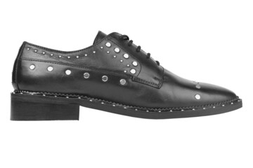 Women's leather boots close-up black color. Oxford style shoes. Casual shoes. File contains...