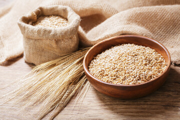 barley grains on a wooden table