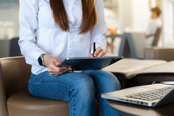 .Working Process in Modern Office. Young Woman Account Manager Working at Wood Table with New Business Project. Typing keyboard,Using Contemporary Laptop.