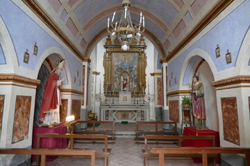 Fototapeta na wymiar St. Biagio church in Matera, the interior with the central nave rich of colorful frescos