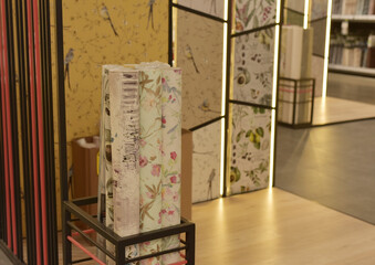 Rolls of wallpaper in the store