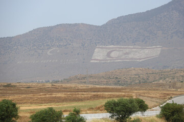 turkish flag painted on a hill in northern Cyprus