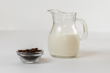 Dalgona coffee ingredients. Coffee beans and milk.