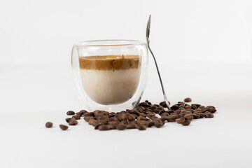 Cold dalgona coffee. Whipped instant coffee. Popular coffee. Latte espresso with coffee foam in a glass.