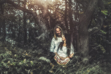 Fototapeta na wymiar medieval man with beautiful medieval woman in outdoor.
