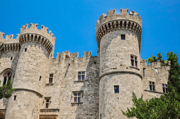 Fototapeta na wymiar Palace of the Grand Master of the Knights of Rhodes with Blue Sky during Summer Day. Beautiful Medieval Castle in Greece.