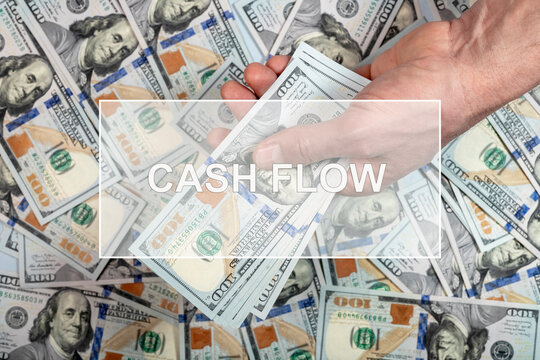 Cashflow word. Cash flow concept with photo of money.