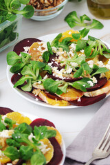 Beetroot and oranges fresh vegetarian salad	