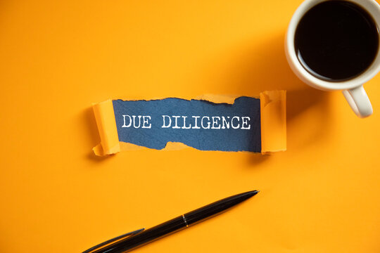 due diligence text on torn paper