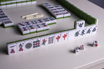 Mahjong. Riichi Mahjong set for playing. Space for text.